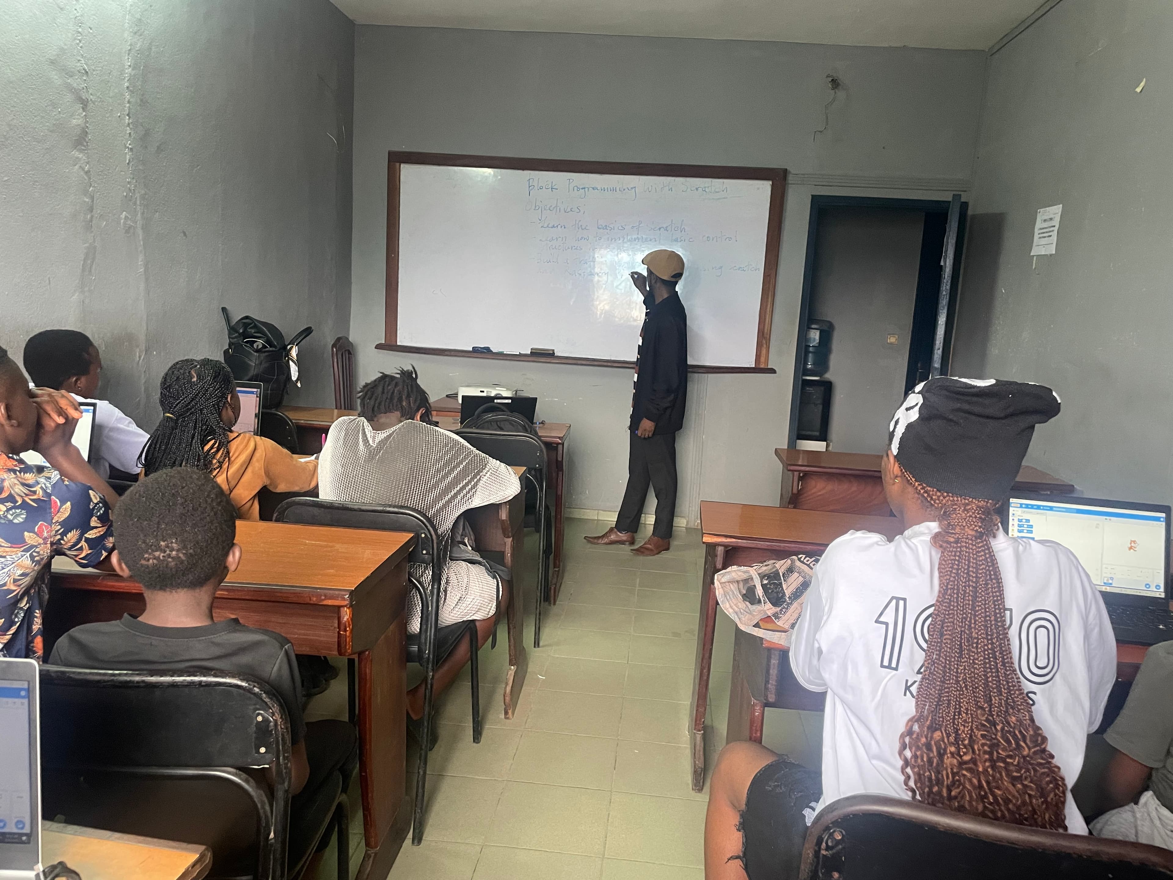 Students focused on their laptops during class
