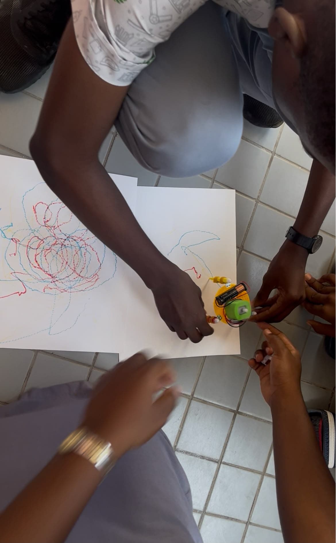 A student-built drawing robot creating spirograph art