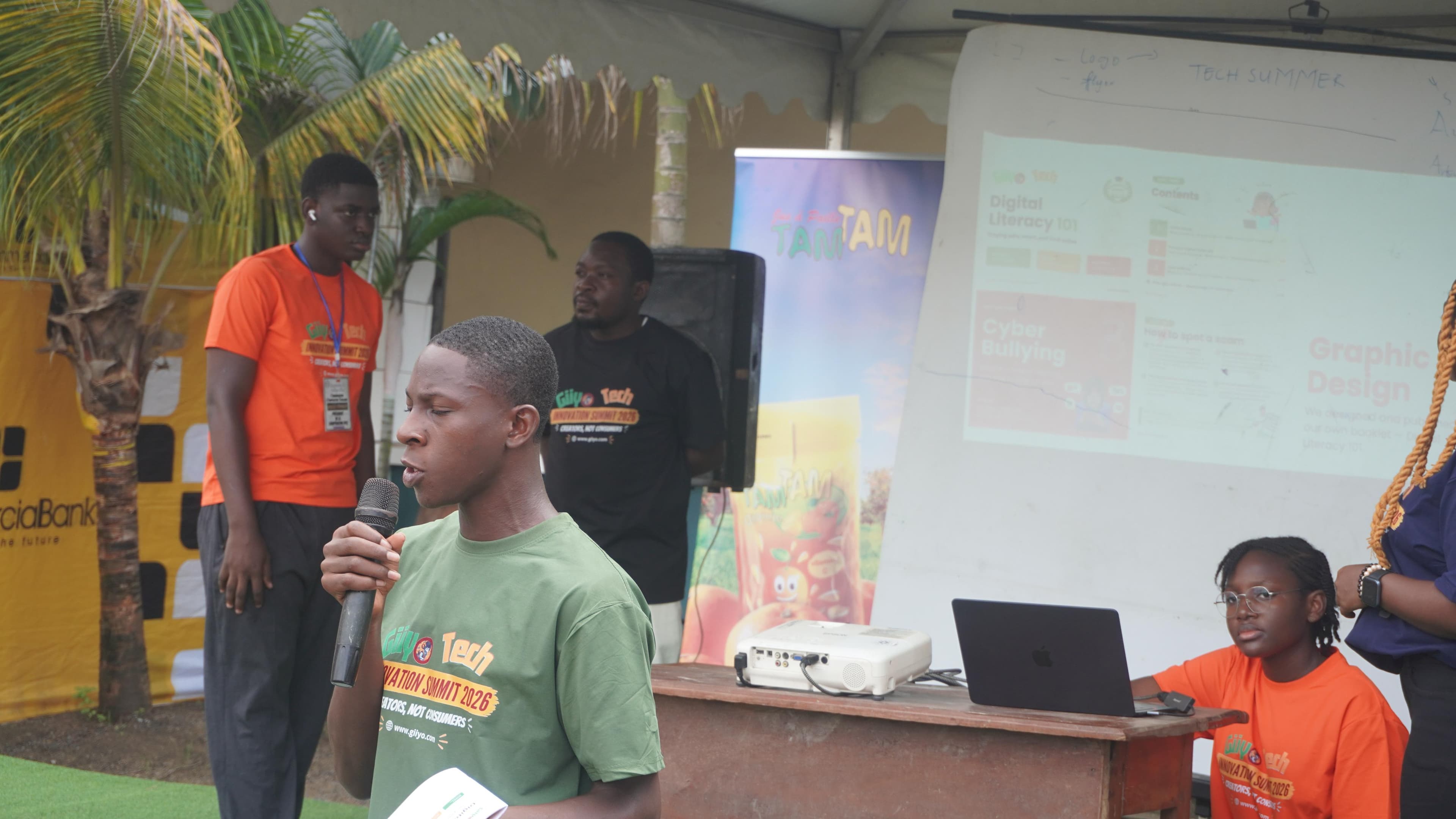 A student presents his project on stage at the Giiyo Tech Innovation Summit 2026