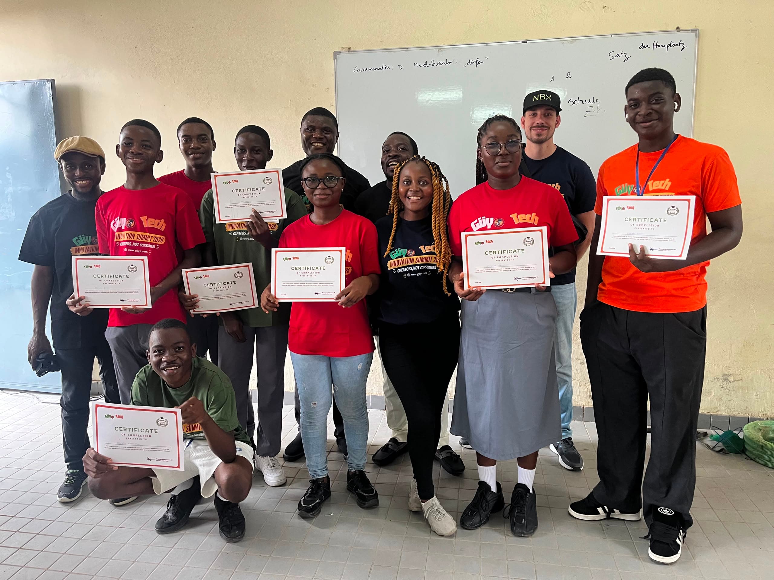 Graduates hold their Certificates of Completion at the Innovation Summit 2026
